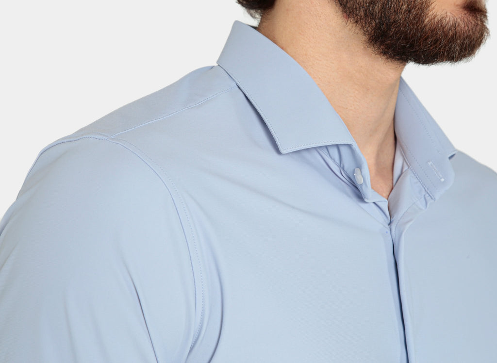 Camisa masculina azul claro tech stretch Aero Dynamic, corte ergonômico com máxima elasticidade e proteção UV para conforto total no treino e no dia a dia