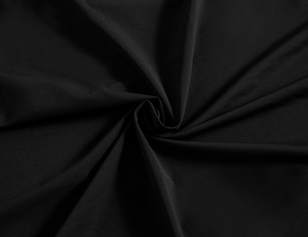Camisa preta em poliamida tecnológica stretch, máxima elasticidade e conforto térmico superior com acabamento premium que dispensa o uso de ferro